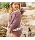 Niña con el Conjunto Pololo bebé berenjena canalé volante floral tejido suave invierno