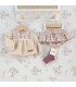 Conjunto Pololo bebé arena algodón blusa textura suave con canesú floral y pololo estampado