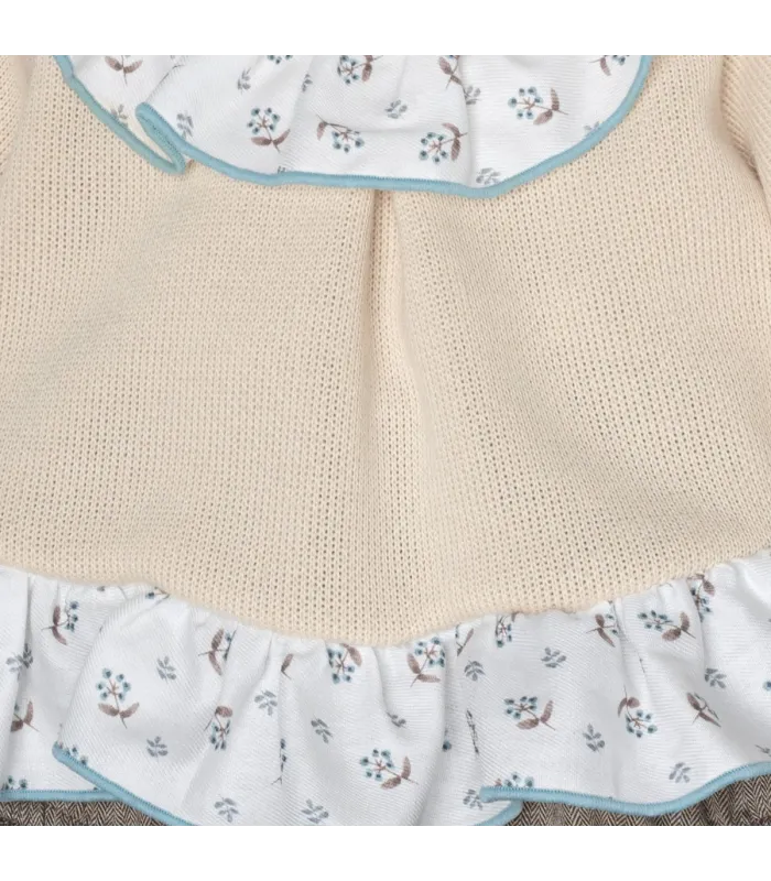Detalles del diseño del conjunto pololo bebé crudo volante cuello estampado ribete celeste pololo algodón invierno