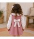 Niña con vvestido niña nude floral lazo invierno rosa empolvado mangas algodón estampado cuello redondo