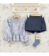 Conjunto niña azul toile blusa volantes falda pantalón textura detalle elegante