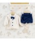Conjunto Pololo bebé azul marino elegante con camisa blanca pajarita y pantalón corto tejido suave invierno