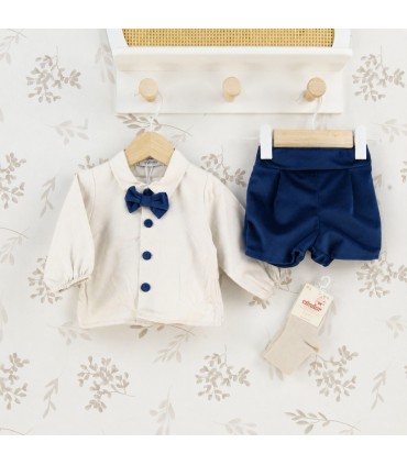 Conjunto Pololo bebé azul marino elegante con camisa blanca pajarita y pantalón corto tejido suave invierno