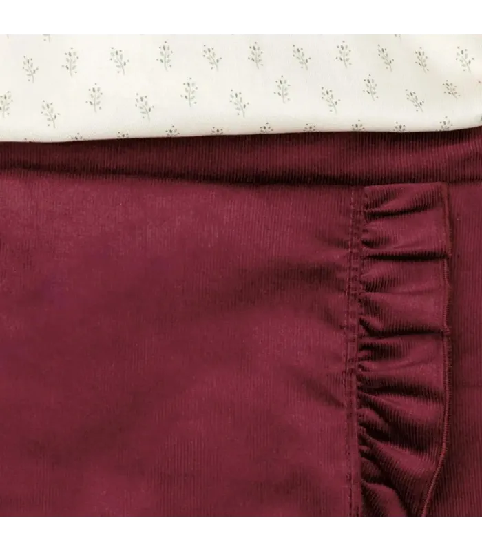 Detalle del conjunto niña granate falda pantalón algodón blusa estampada volante detalle