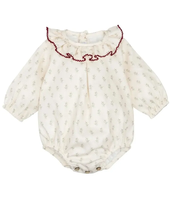 Pelele bebé crudo algodón estampado cuello volante detalle contraste en fondo blanco