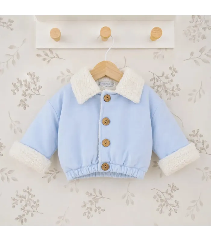 Chaqueta bebé celeste algodón suave interior borreguito botones invierno detalle tejido