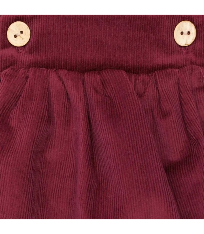 Diseño del Peto Bebé Granate algodón con tirantes botones madera tejido suave bombacho
