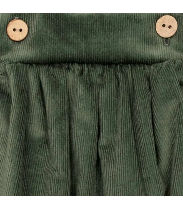 Diseño del Peto Bebé Verde algodón con tirantes botones madera tejido suave bombacho