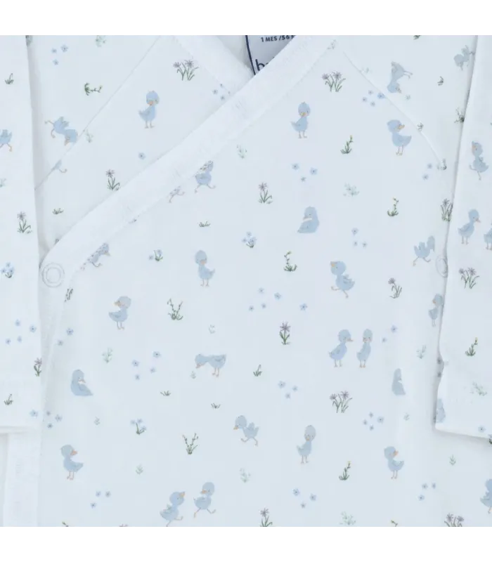 Conjunto nacimiento Nido celeste de algodón con pelele, body y babero estampado