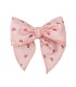 Lazo Pelo bebé rosa empolvado con estampado suave y pinza detalle delicado infantil en fondo blanco