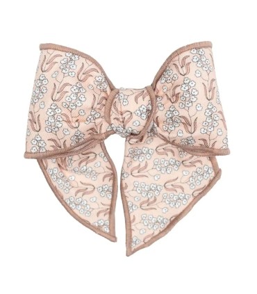 Lazo Pelo bebé rosa viejo estampado con pinza grande tejido suave detalle elegante en fondo blanco