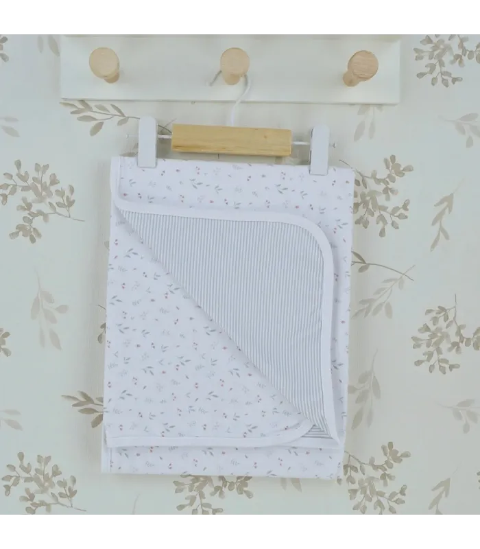 Arrullo reversible flor bebé marfil de algodón con estampado floral y reverso de rayas
