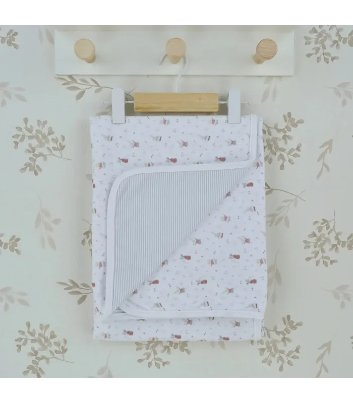Arrullo reversible bebé marfil de algodón con estampado floral y reverso de rayas