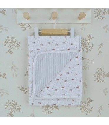 Arrullo reversible bebé marfil de algodón con estampado floral y reverso de rayas