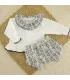 Conjunto pololo bebé niña negro Alisio 100% algodón cuello volante y detalles metalizados