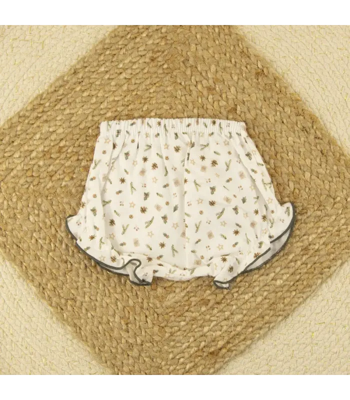 Braguita de niña estampada con motivos navideños de pinos, estrellas y adornos en tonos beige y verde de Calamaro