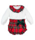Conjunto bebé Calamaro de cuadros escoceses rojos y lazo verde. Fondo blanco.