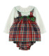 Vestido de cuadros escoceses Babyfer con camisa blanca y lazos verdes. Fondo blanco.