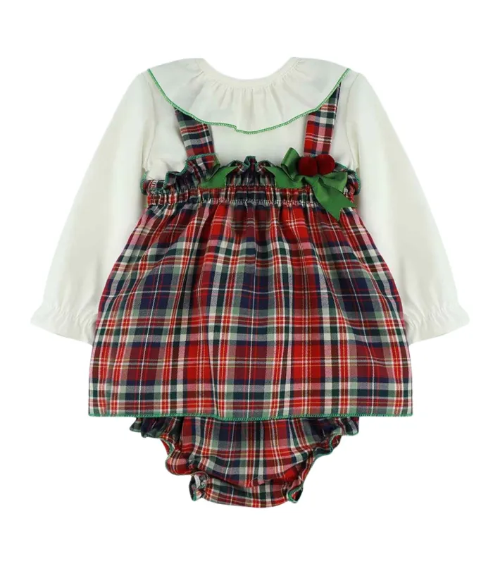 Vestido de cuadros escoceses Babyfer con camisa blanca y lazos verdes. Fondo blanco.