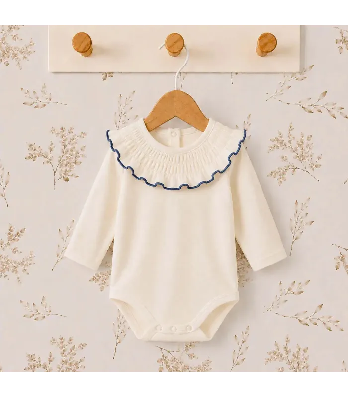 body bebé azul volante ribete manga larga algodón elastano elegante cómodo