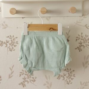 cubrepañal waffle mint calamaro con volantes laterales beb