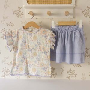 Vestido infantil flores pastel con falda azul Calamaro Shimla